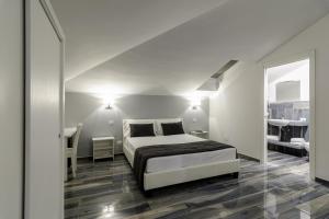 Postel nebo postele na pokoji v ubytování B&B al Palazzo