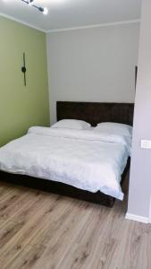 Postel nebo postele na pokoji v ubytování Махаббат + 3 fotografie