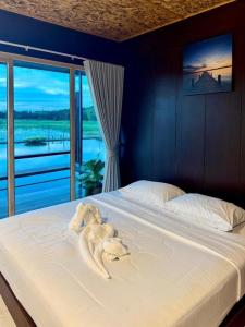 Кровать или кровати в номере Nornnadubua