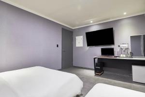 TV a/nebo společenská místnost v ubytování 인천 서구 연호텔