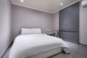 Postel nebo postele na pokoji v ubytování 인천 서구 연호텔 + 10 fotografií