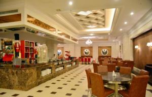 Χώρος καθιστικού στο Inzone Garland Hotel Taian