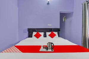 Ένα ή περισσότερα κρεβάτια σε δωμάτιο στο Collection O Clement Holydays +28 φωτογραφίες