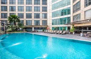 Πισίνα στο ή κοντά στο Wyndham Surabaya