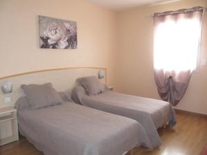 Fotografie z fotogalerie ubytování Hôtel Le Colombier v destinaci Saint-Pantaléon-de-Larche + 17 fotografií