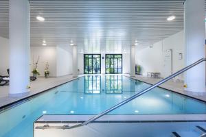 Piscina de la sau aproape de Tertianum Residenza Al Lido - Appartements & Restaurant