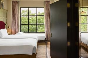 Ένα ή περισσότερα κρεβάτια σε δωμάτιο στο The Hoxton, Southwark