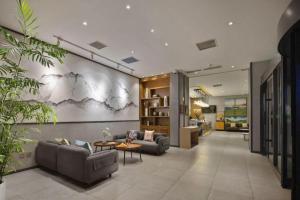 O zonă de relaxare la Qiuguo Hotel Beijing BIEC & Airport