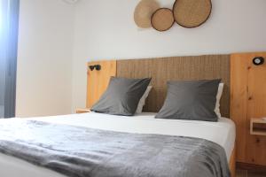 Postel nebo postele na pokoji v ubytování Rosea - Gayarticaz Reunion + 17 fotografií