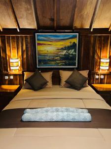 Postel nebo postele na pokoji v ubytování Dopi Rinjani Homestay