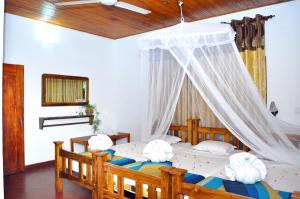 Um quarto em Heritage Walawa Resort