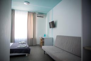 TV a/nebo společenská místnost v ubytování Volna Hotel