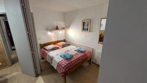 Postel nebo postele na pokoji v ubytování L'alpage