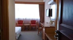 TV a/nebo společenská místnost v ubytování Grand Barakah Hotel