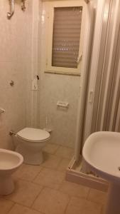 Kúpeľňa v ubytovaní San Pietro Apartments