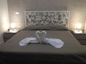 Posteľ alebo postele v izbe v ubytovaní Casa Vacanze Giani