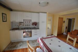 A kitchen or kitchenette at Sabrina Fantasia