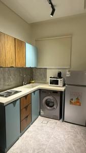 Kuchyň nebo kuchyňský kout v ubytování شقة مخدومة خاصة