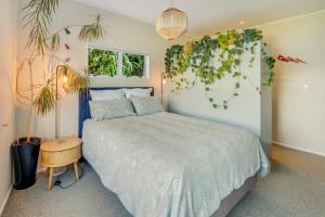 Ένα ή περισσότερα κρεβάτια σε δωμάτιο στο Wellington Seaside Haven