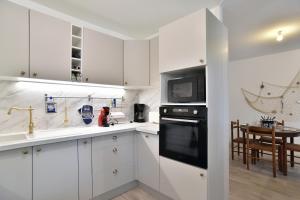 Η κουζίνα ή μικρή κουζίνα στο Chez Josse - A 10 min de St-Cast