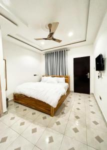 Ένα ή περισσότερα κρεβάτια σε δωμάτιο στο Zuni Apartment