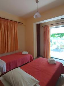 Ένα ή περισσότερα κρεβάτια σε δωμάτιο στο Vardia Room