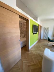 Μια τηλεόραση ή/και κέντρο ψυχαγωγίας στο Villa al Parco +34 φωτογραφίες