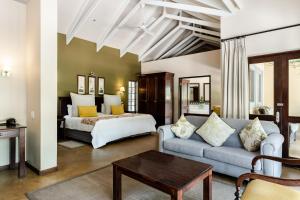 Ένα ή περισσότερα κρεβάτια σε δωμάτιο στο Perry's Bridge Hollow Boutique Hotel