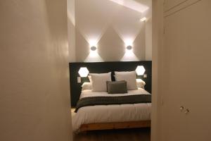 Ένα ή περισσότερα κρεβάτια σε δωμάτιο στο A L'Esquirot