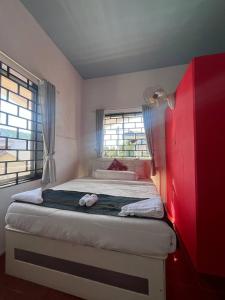 Кровать или кровати в номере Paradise Tropica kampot