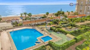 Πισίνα στο ή κοντά στο Beautiful bungalow on the Torrox-Costa boulevard!