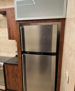 Η κουζίνα ή μικρή κουζίνα στο شقة lvaisa الفندقيه