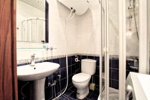 Koupelna v ubytování Hazz Palace Hotel