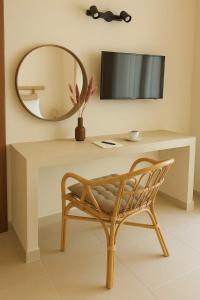 Μια τηλεόραση ή/και κέντρο ψυχαγωγίας στο Corfu's Hidden Gem - Serene Quad +11 φωτογραφίες