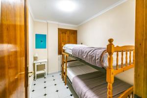 Postel nebo postele na pokoji v ubytování Urbanizacion Bahía Azul B-33