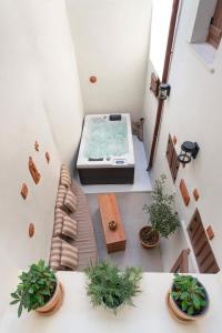 a view from the top of a room with a tub at Rodos Old Town Aqua Luxury House in Rhodes Town