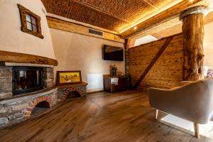 Μια τηλεόραση ή/και κέντρο ψυχαγωγίας στο Domaine Valleise - Wine & Rooms