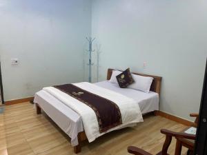 Giường trong phòng chung tại Ciao Homestay