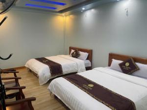 Ένα ή περισσότερα κρεβάτια σε δωμάτιο στο Ciao Homestay +11 φωτογραφίες