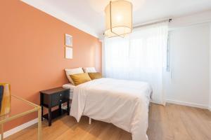 Postel nebo postele na pokoji v ubytování M055 Marquer T4 lumineux