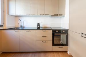 Kuchyň nebo kuchyňský kout v ubytování M055 Marquer T4 lumineux + 18 fotografií