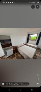 TV a/nebo společenská místnost v ubytování Pousada Fernandes