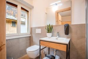 Koupelna v ubytování Garni Pola + 34 fotografií