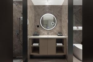 Koupelna v ubytování Huanman Hotel Luoyang Yingtianmen Jiefang Road Metro Station Branch