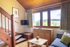 TV a/nebo společenská místnost v ubytování Hapimag Ferienwohnungen Unterkirnach