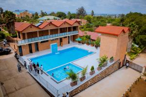 an overhead view of a swimming pool at a house at Pallotti Hotel in Kigali
