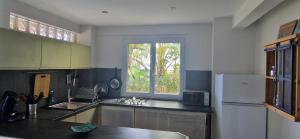 Η κουζίνα ή μικρή κουζίνα στο Ti coin fleuri