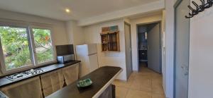 Η κουζίνα ή μικρή κουζίνα στο Ti coin fleuri +5 φωτογραφίες