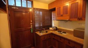 Η κουζίνα ή μικρή κουζίνα στο Lagoon Residence @ Langkawi