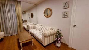 Ένα ή περισσότερα κρεβάτια σε δωμάτιο στο My Resort HuaHin